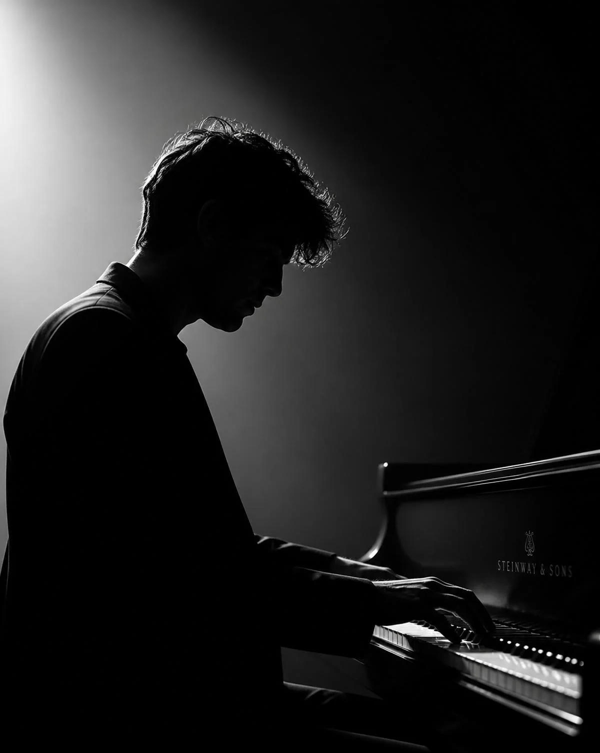 Portrait of Jacob Kennedy at the piano